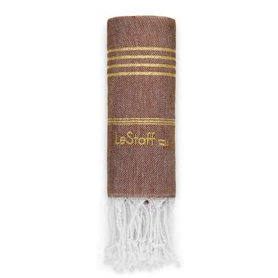 Sie sehen eine Packung LeStoff Hamamtuch Brown-Gold, Produktbild: 01 LeStoff Hamamtuch Brown-Gold, A-Nr.: 5839807 - 01